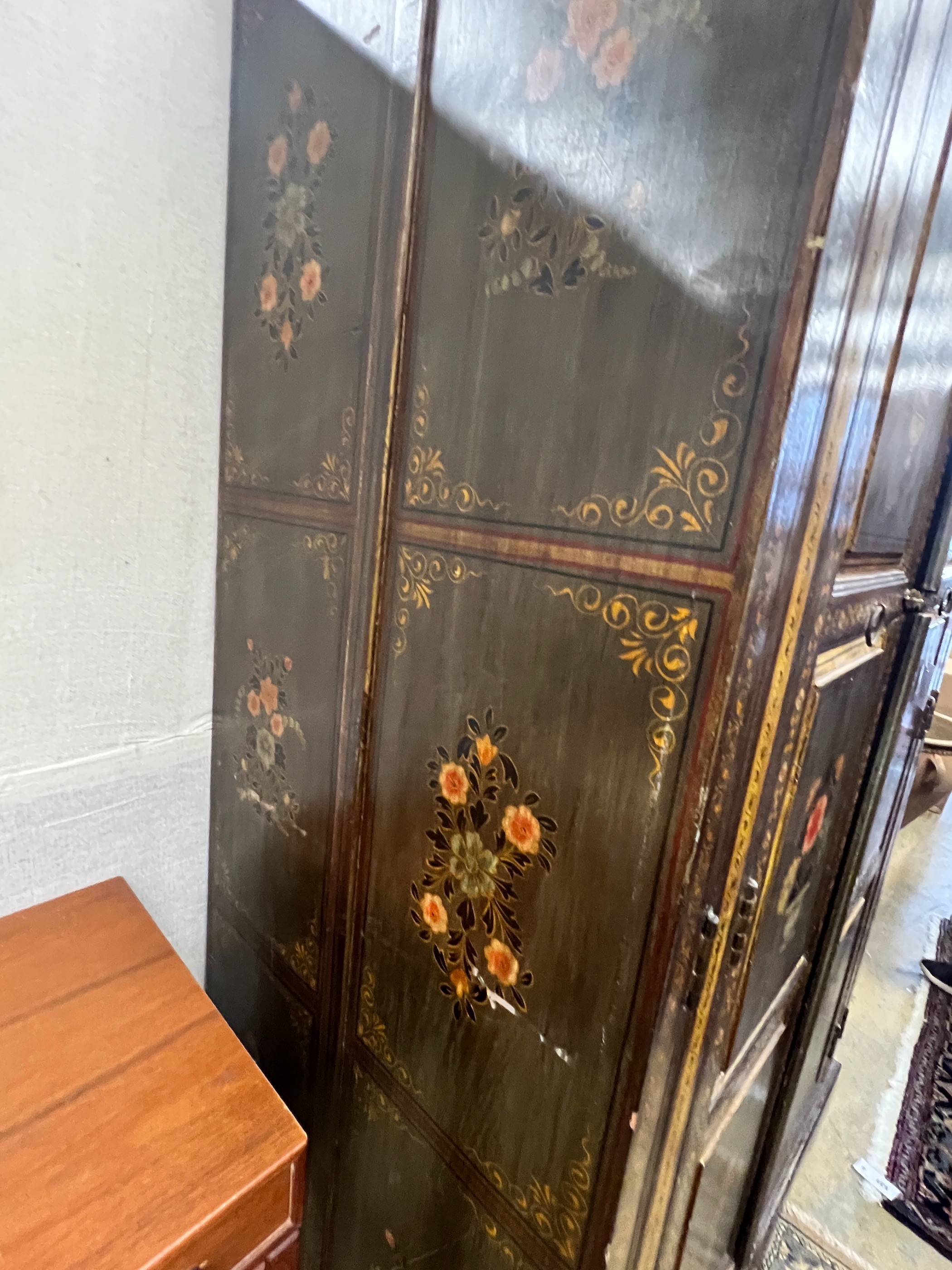 An Indian painted hardwood two door cupboard, width 120cm, depth 70cm, height 185cm